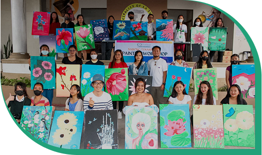 Group holding flower artworks